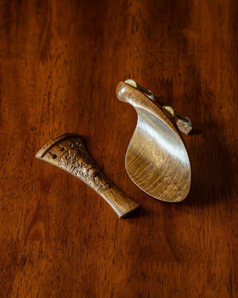 A “Lionshead” model violin tailpiece and Guarneri Chinrest